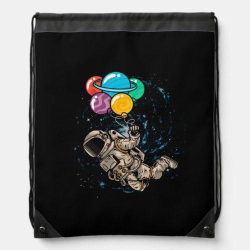 astronaut floating in space using planet balloon drawstring bag