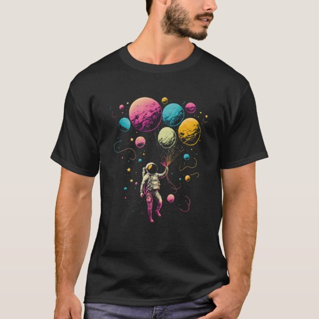 Astronaut Holding Planet Balloons Explore Space in T-Shirt (Front)