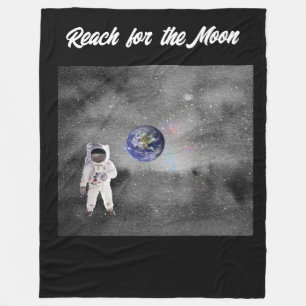Astronaut in Outer Space Reach for the Moon Fleece Blanket