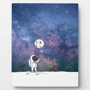 Astronaut in space with moon balloon cosmos stars plaque