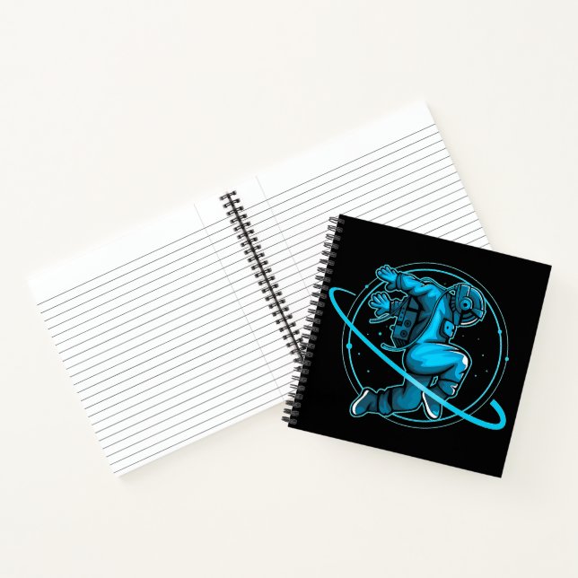 Astronaut Jumping Dancing Around Saturn Artwork | Notebook (Inside)