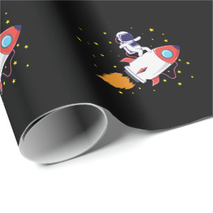 Astronaut on rocket wrapping paper