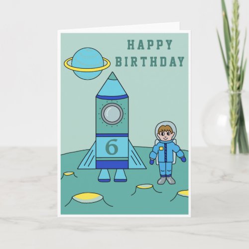 Astronaut on the Moon Space  Happy Birthday Card - A space Happy birthday greeting card. A costumizable and personalizable birthday card. This card has an astronaut and his rocket ship on the Moon or any other planet. The boy in a blue astronaut suit and his blue rocket with the age number on it are in the space. The boy astronaut makes this great as a happy birthday card for a boy's birthday.
You can personalize it by changing the age number on the rocket ship.