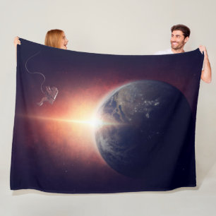 ASTRONAUT OVER the EARTH Fleece Blanket