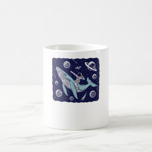 Astronaut riding a whale coffee mug