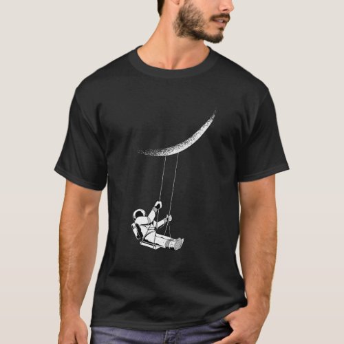 Astronaut Swinging On A Swing Hanging From The Moo T_Shirt