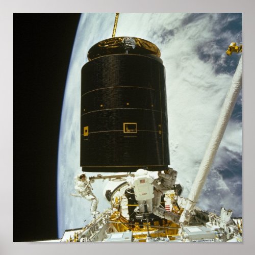 Astronauts capture and repair INTELSAT VI STS_49 Poster