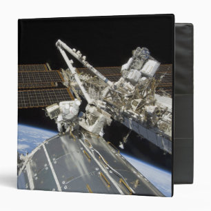Astronauts perform a series of tasks binder