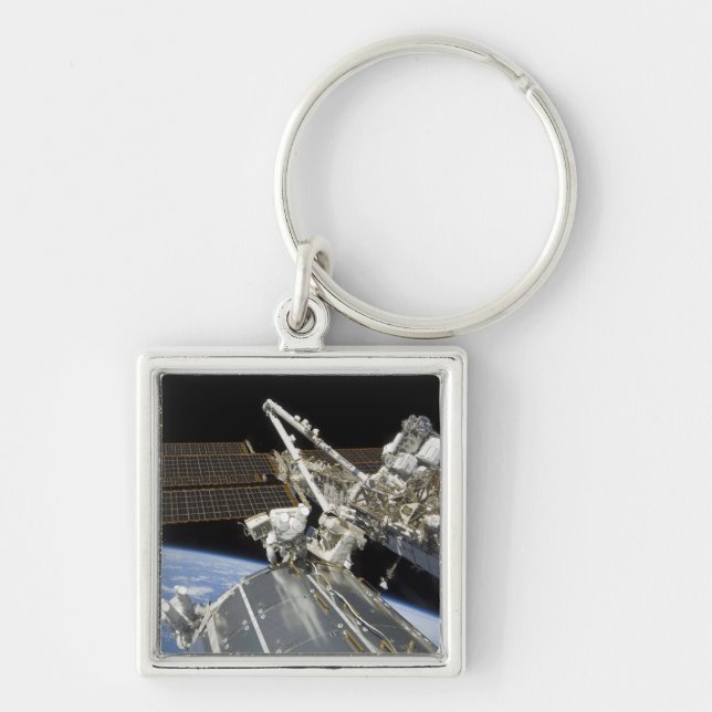 Astronauts perform a series of tasks keychain (Front)