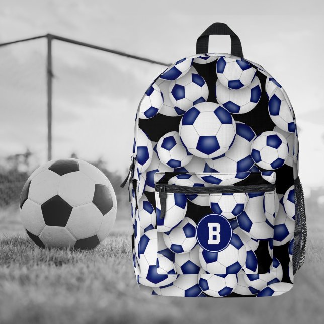 athletes monogrammed blue white soccer balls printed backpack (Front view soccer backpack with athlete monogram & pattern of blue & white team color soccer balls)
