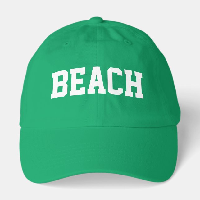 Athletic White BEACH Text Kelly Green Background Hat (Front)