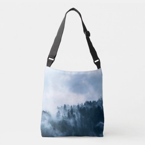 Atmospheric Fog over a Forest Crossbody Bag