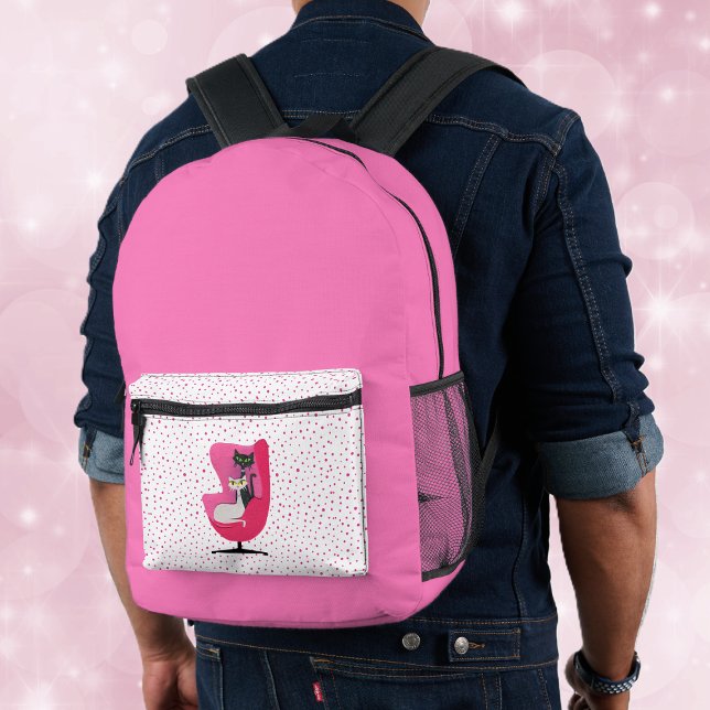 Atomic Cats in Pink Chair Bright Pink With Dots Printed Backpack (Hot pink back pack with pink dots and two atomic cats in a pink chair on the front pocket.)