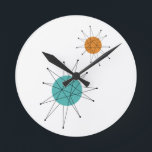 Atomic Franciscan Starburst Turquoise Orange Round Clock<br><div class="desc">This fabulous mid century modern wall clock features Franciscan Starbursts in turquoise blue and orange. Makes a statement in your home!</div>