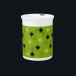 Atomic Green Starbursts Pitcher<br><div class="desc">This Atomic Green Starbursts Pitcher has all of the mid century modern fun of your grandma’s kitchen, minus the sticky linoleum. The kitschy design features a green background with gold speckles and randomly placed starbursts in black, and two shades of green. This vintage inspired pattern is mod enough to be...</div>