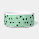 Atomic Jade and Mint Starbursts Ceramic Pet Bowl<br><div class="desc">This Atomic Jade and Mint Starbursts Ceramic Pet Bowl has all of the mid century modern fun of your grandma’s kitchen, minus the sticky linoleum. The kitschy design features a jade background with gold speckles and randomly placed starbursts in black, jade, and mint. This vintage inspired pattern is mod enough...</div>