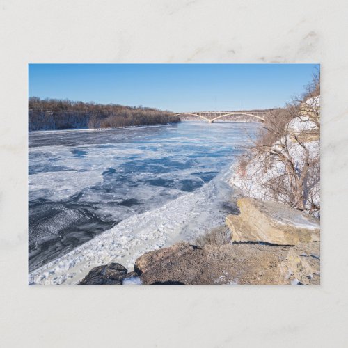 Atop cliff overlooking frozen mississippi river holiday postcard
