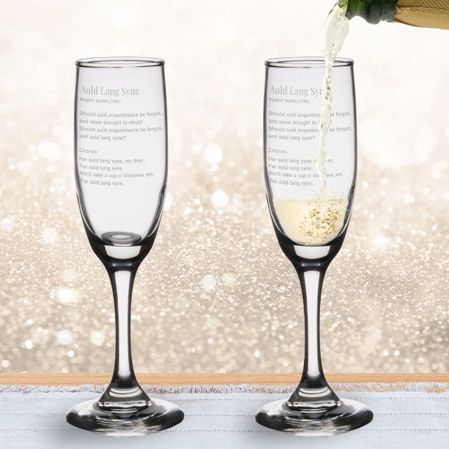 Auld Lang Syne Words Elegant New Year's Eve Toast Champagne Flute (Champagne flutes for New Year celebrations, featuring words from the song 'Auld Lang Syne')