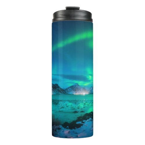 Aurora borealis over the sea coast snowy mountain thermal tumbler