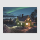 Aurora borealis over winter cabin (Front)