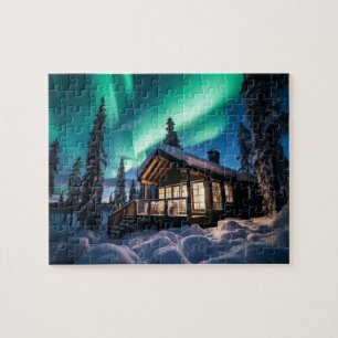 Aurora borealis over winter cabin jigsaw puzzle