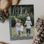 Autograph | Merry Christmas Vertical Photo Holiday Card<br><div class="desc">Send holiday greetings to friends and family in chic style with our elegant photo cards. Design features your favorite vertical or portrait oriented photo with "Merry Christmas" overlaid across the top in white hand lettered script. Personalize with your family name and the year beneath.</div>