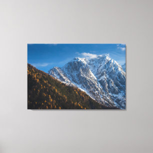 Autumn and winter at snowy mountains canvas print