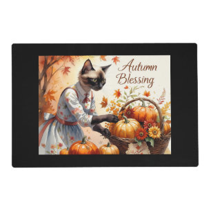 Autumn cat is arranging pumpkin basket placemat