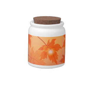 Autumn design with maple leaves and bokeh effect candy jar