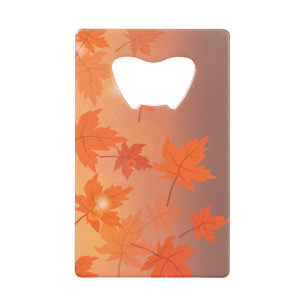 Autumn design with maple leaves and bokeh effect credit card bottle opener