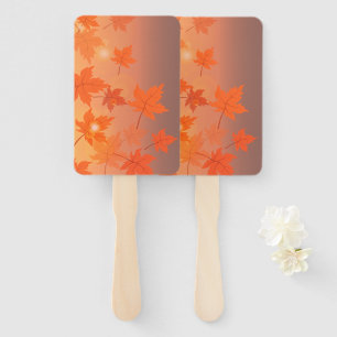 Autumn design with maple leaves and bokeh effect hand fan