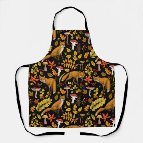 Autumn foxes on black apron