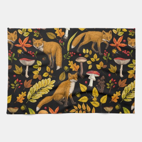 Autumn foxes on black kitchen towel