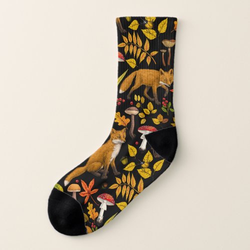 Autumn foxes on black socks