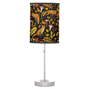 Autumn foxes on black table lamp