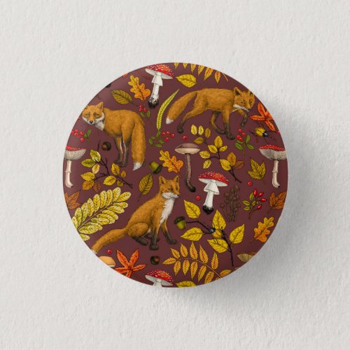 Autumn foxes on chocolate brown button