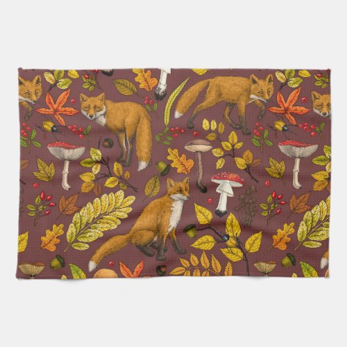 Autumn foxes on chocolate brown kitchen towel