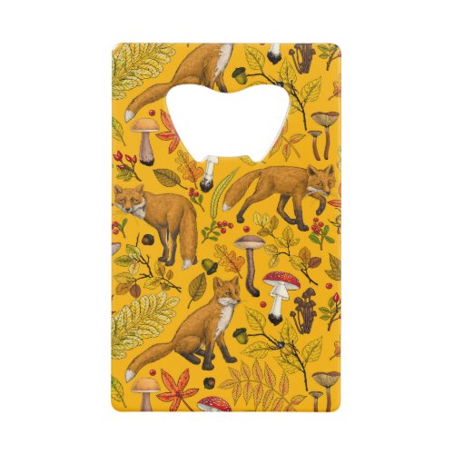 Autumn foxes on orange credit card bottle opener