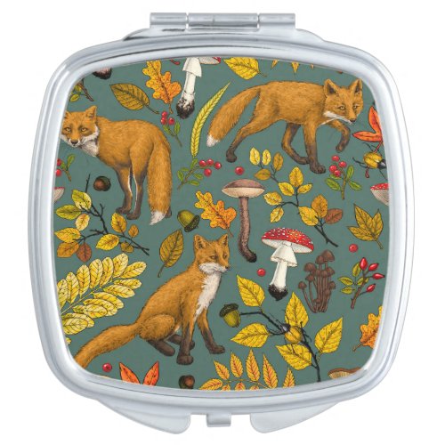 Autumn foxes on pine green compact mirror