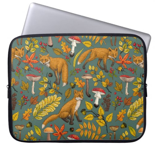 Autumn foxes on pine green laptop sleeve