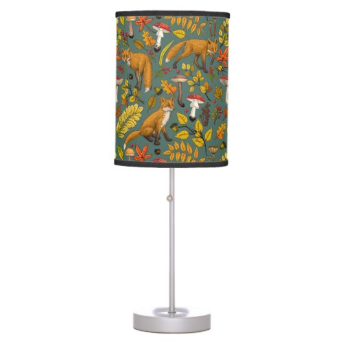 Autumn foxes on pine green table lamp