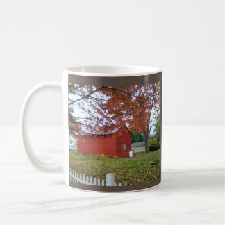 Autumn leaves and a sweet red barn on a mug. coffee mug