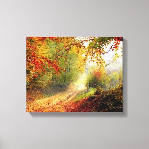 Autumn Leaves and Trees Covering Dirt Road Canvas Print