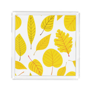 Autumn leaves in yellow acrylic tray