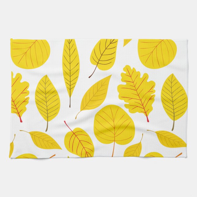 Autumn leaves in yellow kitchen towel (Horizontal)