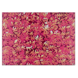 Autumn leaves, shades of red and orange cutting board