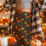 Autumn Maple Leaves Fall Navy Leggings<br><div class="desc">Celebrate the changing season in style with these Autumn Maple Leaves Fall Navy Leggings. Showcasing a beautiful pattern of vibrant maple leaves in red, orange, and yellow against a rich navy background, these leggings are perfect for embracing the warmth and colors of autumn. Ideal for both casual wear and festive...</div>