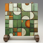 Autumn Medley Faux Relief Ceramic Tile<br><div class="desc">This ceramic tile is a masterpiece of visual complexity, simulating a textured assemblage of shapes and colors reminiscent of an autumnal landscape. The flat surface is a canvas for the faux relief technique, presenting an array of curved and angular forms. Hues of pumpkin orange, creamy ivory, and varying shades of...</div>