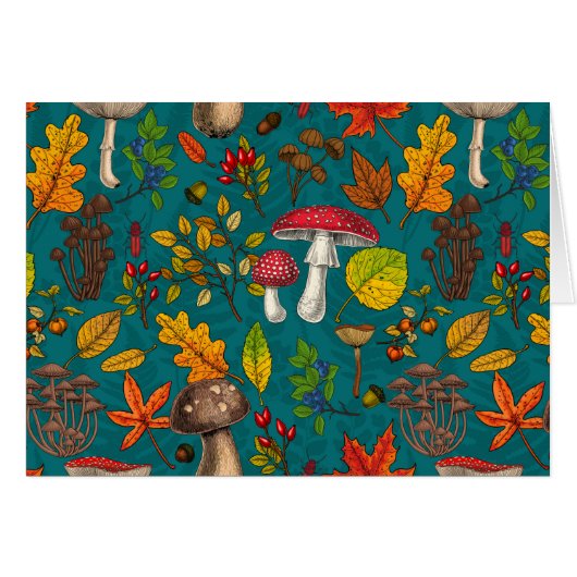 Autumn mushrooms, leaves, nuts and berries on blue (Front Horizontal)
