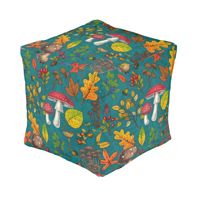 Autumn mushrooms, leaves, nuts and berries on blue pouf (Angled Front)